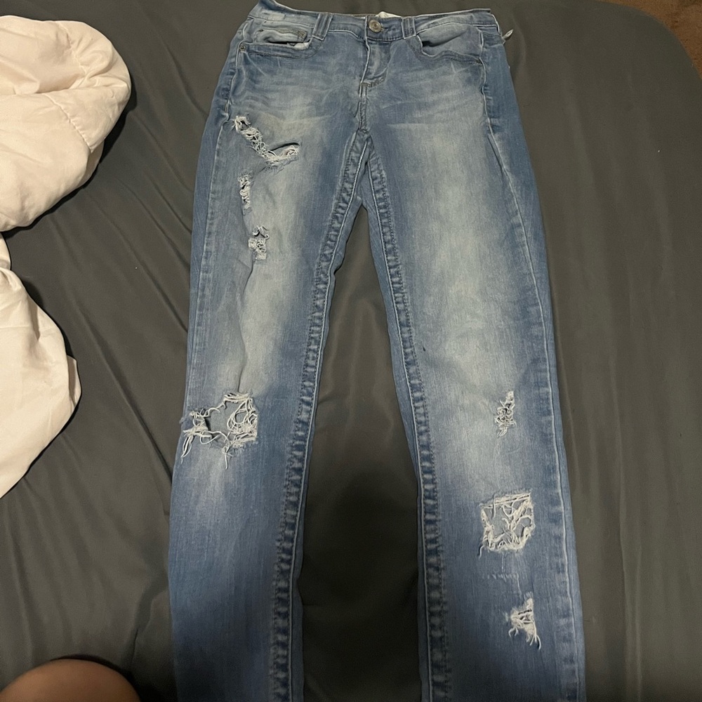 Blue ripped jeans